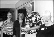 From left, Suzanne McColl, Lucy Price, Robert McColl and Roxie
Harmon attend a reception to celebrate the retirement of dentist
David Brzoska. More than 350 people attended the reception Aug. 2
in the atrium of the office, 826 Iowa.