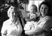 Patients of dentist David Brzoska attend his retirement
celebration. Jo Bussell and her daughter Marci Schroeder and
granddaughter Ericka Schroeder were all Brzoska's patients. The
retirement party was Aug. 2 in his office, 826 Iowa.