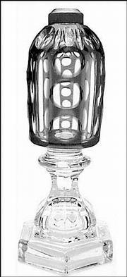 The glass font on this whale-oil lamp was made of colorless glass
covered with ruby glass overlay cut into a design. The 10 1/2-inch
lamp, made in New England, sold for $1,870 this summer at Green
Valley Auctions, Mt. Crawford, Va.