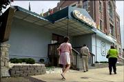 Pedestrians pass the Wyandotte 7th Street Casino in Kansas City,
Kan. An Oklahoma-based Indian tribe opened the downtown casino
Thursday, despite opposition from state officials.