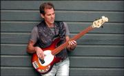 Stan Shelton, an Ottawa native, leaves today for Russia. Shelton is
playing bass behind bluesman Jimmy D. Lane.