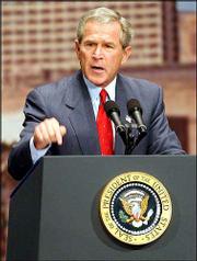 President Bush outlines his plan for economic recovery during a
40-minute speech in Kansas City, Mo. Bush said Thursday at
Municipal Auditorium that the economy was improving and credited
the upturn to his tax-cutting programs.