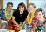 From left, Barb Riley, Ginger Wehner, Pat Hohman and Denise
Johnson, all of Lawrence, attend the River City Cosmopolitan Club's
2003 Inaugural Luau. The event was Aug. 16 in Lawrence.