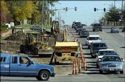 Construction of a right turn lane on Sixth Street at Lawrence
Avenue reduces the busy street to only one westbound lane. The city
is spending $253,000 on the project that also will add traffic
signals that allow left turns. Wednesday, traffic backed up on
Sixth Street beyond Schwarz Road.