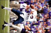 6-3, 205, Jr., San Diego Strengths: Intelligence, maturity.
Weaknesses: Didn't show ability to throw down field last week at
Kansas State. Games: One Comp-Att-Int: 8-12-0 Passing yards: 33
Briefly: Started the season opener at Palomar (Calif.) Junior
College last season but broke his thumb and was a backup rest of
season. ... Had Division I-AA scholarship offers but opted to
walk-on at KU.