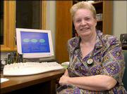 Dr. Mary Vernon, of the Lawrence Family Practice Center, displays a
PowerPoint presentation explaining the Atkins Diet, one which is
quickly becoming a popular method of weight loss. Vernon is one of
only three doctors nationwide who serves on the Atkins Physicians
Council. The council provides guidance for the educational
information products and programs undertaken by Atkins Nutritionals
Inc.