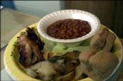 A meal of fried quail, fried potatoes, venison chili and rolls was
prepared by Mike Eckman Saturday for hunters at Eckman Hunting
Preserve. Eckman has prepared many meals using a variety of wild
game.