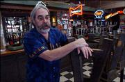 Rick Younger, owner of Rick's Place, 623 Vt., has hit a snag in
moving his bar to the former location of Dodson's Liquor, 846 Ill.
At Tuesday's City Commission meeting, Old West Lawrence
neighborhood residents will ask the city to deny a variance Younger
needs to locate his bar in the strip mall, which also is home to a
church.