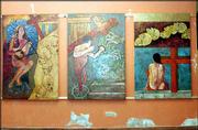 A religious-themed tryptich by Cuban artist Fito Garche graces the
walls at The Red Dresser, 624 N. Second St. The show, "Memories of
Havana," remains on view through December.
