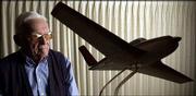 Gene Burnett, Lawrence, trained to become a military pilot in the
1940s and then spent the majority of his life training pilots above
the Lawrence area. Burnett, 84, displayed a model of the V-35 Beach
Bonanza, an exact replica of his prized personal aircraft, in his
west Lawrence home.