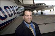 Ross Razak, 31, is one of four pilots at KU who operate aircraft
for Kansas University. The university has two planes, a Cessna
Citation and a KingAir.