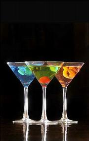 From left, a Tropical Martini, an Apple Sour Martini and a
Cosmopolitan. They were mixed up last week at Marisco's Bar &
Grill in Lawrence.