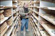 Olathe writer Laird Wilcox looks through his personal collection of
political papers and paraphernalia at Kansas University's Spencer
Research Library. Wilcox has been writing about and collecting
materials on political extremists since the 1960s.
