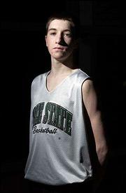 Roger Morningstar's son, Brady Morningstar, a Free State High
junior, has much in common with his father.
