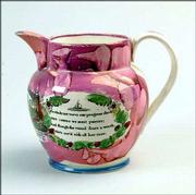 Slogans such as "The Great Australia Clipper Ship" and "Success to
the Fisherman" decorate this pink bubble luster jug. The
9-inch-high jug, made in the early 19th century, auctioned for
$460.
