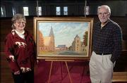 Judy and Dennis Dailey have given an oil painting to First United
Methodist Church. The painting shows the church, Trinity Episcopal
and Plymouth Congregational from a view looking north down Vermont
Street.