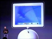 Apple Computers Inc. chief executive Steve Jobs introduces the new
flat screen iMac at Macworld in San Francisco in this Jan. 7, 2002,
file photo. Twenty years ago, Apple Computers Inc. introduced its
revolutionary Macintosh computer with a Super Bowl ad. Since then,
other companies have changed the functions and looks of their
computers to compete with the user-friendly Mac.