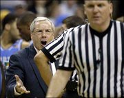 North Carolina coach Roy Williams shouts at a referee during the
second half against Wake Forest. The Tar Heels beat the Demon
Deacons, 79-73, Saturday in Winston-Salem, N.C.