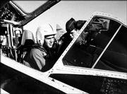 George W. Bush sits in an F102 fighter jet while serving in the
Texas Air National Guard in this undated photo. Questions about the
president's National Guard duty in the 1970s continued Wednesday,
prompting White House spokesman Scott McClellan to denounce the
inquiries as "gutter politics."