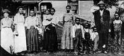 The George Washington Family in 1902 stands outside their home in
Bloomington. George is second from right.