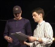 "V Henry K" actor Kevin Siess, left, receives instruction from
James Benkard, director, during play practice at Hashinger Hall. "V
Henry K," which opens Friday, explores the fallout that arises when
a small-town district attorney indicts a legendary ex-statesman for
orchestrating her father&squot;s murder.