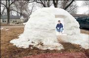 Jason Botz, Lawrence, constructed an igloo recently while waiting
for his wife to give birth to their third child.