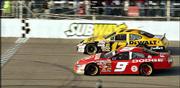 Matt Kenseth (17) beats Kasey Kahne (9) to the finish line of the
Subway 400. Kenseth won the NASCAR Nextel Cup race Sunday at the
North Carolina Speedway near Rockingham, N.C.