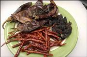 Peppers such as, clockwise from top, Guajillo, Chile de Arbol, and
Chipotle are used in many of the dishes.