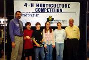 From left are Daryl Buchholz, K-State assistant director of
agriculture; Alex Cox, Jacob Cox, Joanna Wakeman, Lacy Hunsinger,
members of the Douglas County 4-H intermediate horticulture judging
team; and Scott Wise, vice president of Gard 'n-Wise Distributors.
The team took second place in state competition March 6 at the
Wichita Lawn and Garden Show.