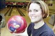 Kelly Zapf, Kansas University's top female bowler, says she's glad
bowling is a club sport at KU. She was pictured Monday at Jaybowl.