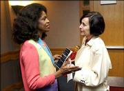 State Rep. Barbara Ballard, D-Lawrence, left, visits with Beverly
Smith Billings at the Women's Recognition Program. The program,
which honored 19 Kansas University students, faculty, staff and
alumni, was Tuesday in the Big 12 Room in the Kansas Union.