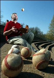 Lawrence resident Bill James, a nationally renowned baseball expert
and senior baseball operations adviser to the Boston Red Sox, has
kept his fame in a Midwest perspective. He feels comfortable living
and working in Lawrence, where he can be both a famous writer and a
normal family man.