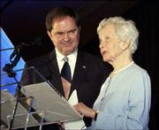 Tensie Oldfather is named the Lawrence Chamber of Commerce's Citizen of the Year in this March 2004 file photo. At left is chamber Chairman Larry McElwain. Oldfather, a noted Lawrence philanthropist, died Tuesday.