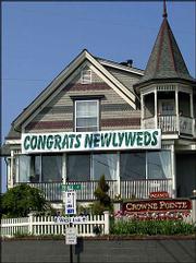 A congratulatory sign for newlyweds appears displayed on the front
of the Crowne Pointe Inn, in Provincetown, Mass., the weekend
before gay marriage is to become legal in the state. Provincetown,
long considered a destination for gay couples to vacation and
relax, is expected to become a location where they may marry as
well.