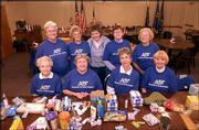 Members of AARP's Lawrence chapter 1696 pose for a picture at the
American Legion, 3408 W. Sixth St. They gathered May 13 to prepare
and send care packages to the soldiers serving in Iraq. Pictured
are, from left back row, Mary Kanous, Darlene Hill, Janice Whitham,
Phyllis Cross and Lauraine Mulally; front row from left, Thelma
Hehn, Marilyn McCleary, Suzanne McColl and Jane Pracht.