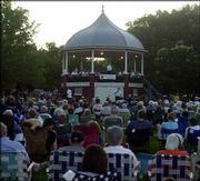 Music lovers attend the season&squot;s first concert by the Lawrence City
Band. The Lawrence band will play in South Park&squot;s gazebo every
Wednesday through July 21. All concerts are at 8 p.m. Wednesday&squot;s
season opener was "A Sesquicentennial Celebration," featuring music
from or about Lawrence and the westward expansion.