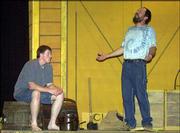Adam Canterbury, Baldwin, as Huck, left, and Ed Lammer, Ottawa,
Huck's father, right, rehearse a scene from "Big River." The
Baldwin City Community Theatre is staging the Broadway musical
based on Mark Twain's "Adventures of Huckleberry Finn" at Baldwin
Junior High.