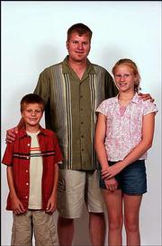 Darin Fischer, art teacher at Prairie Park School, has instructed
both his son, Gavin, 9, left, and his daughter. Haley, 12.