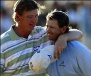 Ernie Els, left, hugs fellow South African Retief Goosen after
Goosen won the U.S. Open. The two played in the final pairing
Sunday in Southampton, N.Y.