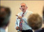 Fred Krebs, who teaches American history at Johnson County
Community College, presents an adult workshop on the
Kansas-Nebraska Act at the Lawrence Visitor Center. Krebs, a
Stephen Douglas scholar, took part in Chautauqua events Friday.