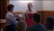 Virginia Conard, Lawrence, left is directed by schoolteacher
Christine Reinhard, right, that she needs to sit on the women&squot;s
side of the room during a "Territorial School House Vignette."
"That&squot;s a great idea," said Conard, as she chose another seat for
Reinhard&squot;s presentation Friday at Watkins Community Museum of
History.