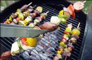Kebobs can be an easy summer meal on the grill. Ingredients usually
include pieces of meat or seafood and a variety of vegetables, or
even fruits.