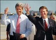 Democratic presidential candidate Sen. John Kerry, D-Mass., left,
and Sen. John Edwards, D-N.C., arrive at Miami International
Airport in this April file photo. Kerry selected Edwards to be his
running mate.