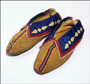 These moccasins, made from leather, glass beads and ribbon
applique, were created by a member of the Delaware Indian tribe.
They&squot;re part of "Vanished Voices: The Legacy of Northeast Kansas
Indians," which opens Saturday in the Spencer Museum of Art&squot;s White
Gallery.
