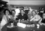 From left, Shelly Bender, Jeanne and Ric Averill, and Steve and
Betsy Clark attend "What Floats Your Boat," a fund-raising event
for Van Go Mobile Arts. The fund-raiser was June 12 at Clinton Lake
Marina. More than 300 people attended the first-year event, which
featured a boat parade, food, drinks, dancing and a live auction.