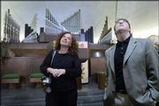 Eve Edelstein, of San Diego, and Steve Flanagan, of Atlanta, look
at the interior of North Christian Church in Columbus, Ind., while
attending a conference on design and religion.