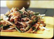 Melon Chicken Salad contains honey, soy sauce, vinegar, daikon
radish and chicken, which makes an interesting combination of
flavors. The dish is from Cooking Light magazine's July issue.