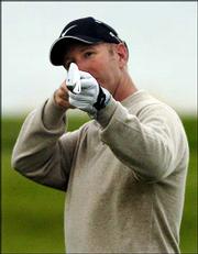 David Duval sights down a shot during a practice round for the PGA
Championship. Duval played Tuesday at Whistling Straits in Haven,
Wis.