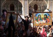 Followers of radical Shiite cleric Muqtada al-Sadr rally outside
the Imam Ali shrine in Najaf, Iraq. Al-Sadr on Thursday ordered his
militia to turn the shrine over to religious authorities after he
was given an ultimatum by Iraq's government. However, he said he
would not disarm his militia.