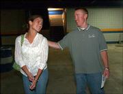 Hooper gets together with his wife, Lindsey, after the game. The
Hoopers, who met while attending college at Wichita State
University, were married in October 2003. Since then, Lindsey has
followed Kevin while he has played for three minor-league teams
this season -- the Isotopes, the Columbus (Ohio) Clippers and
Omaha.